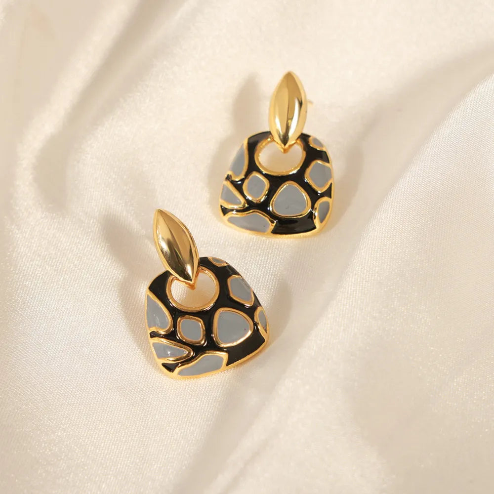 Boucles d'oreilles géométriques léopard - Accessoires mode et élégance