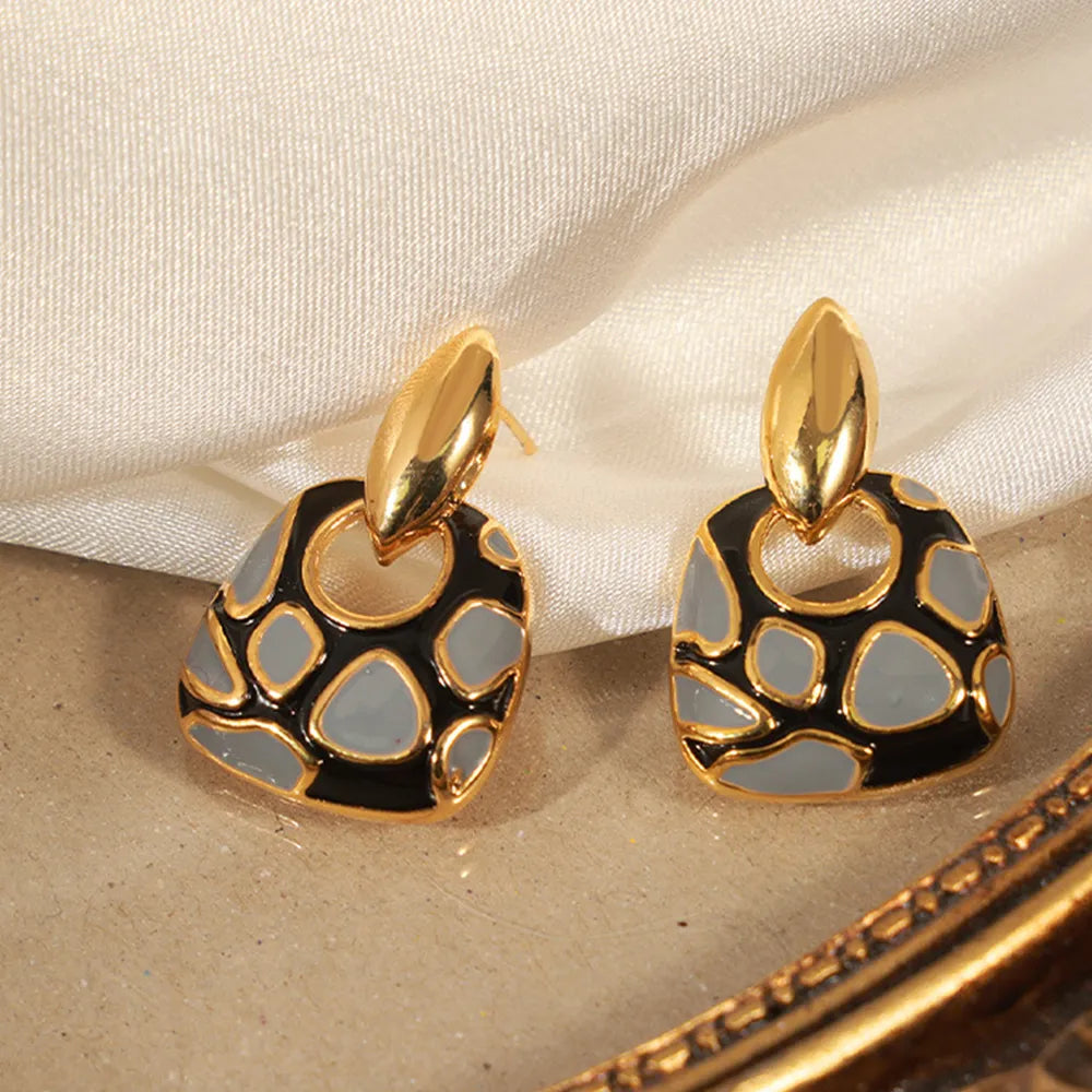 Boucles d'oreilles géométriques léopard - Accessoires mode et élégance