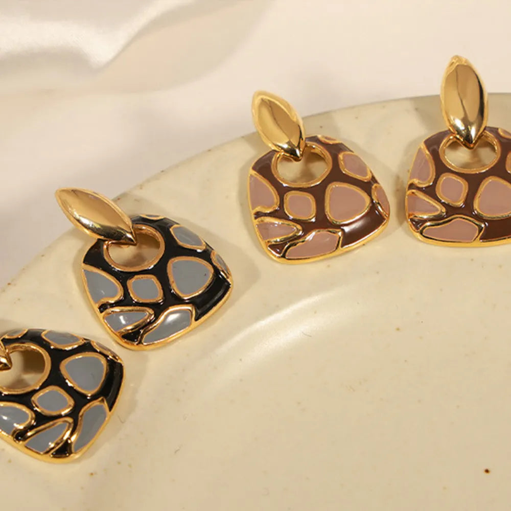 Boucles d'oreilles géométriques léopard - Accessoires mode et élégance