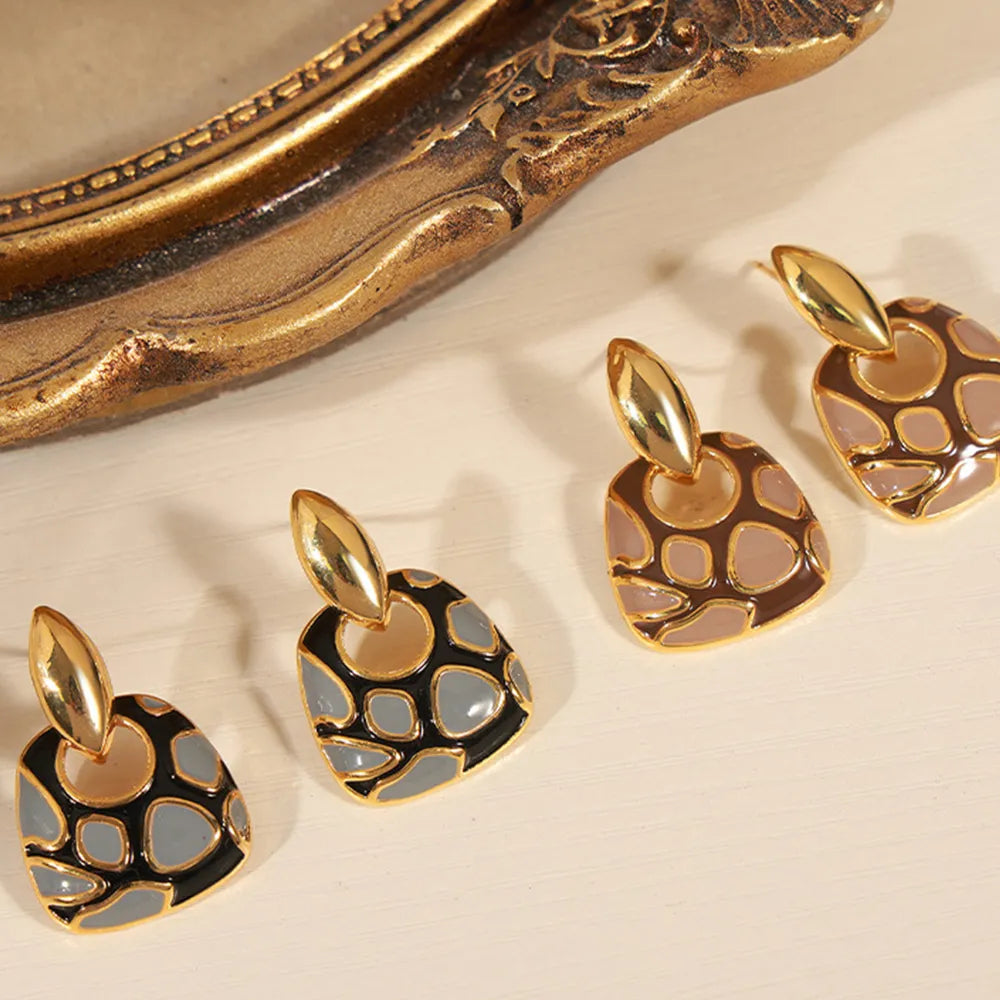 Boucles d'oreilles géométriques léopard - Accessoires mode et élégance